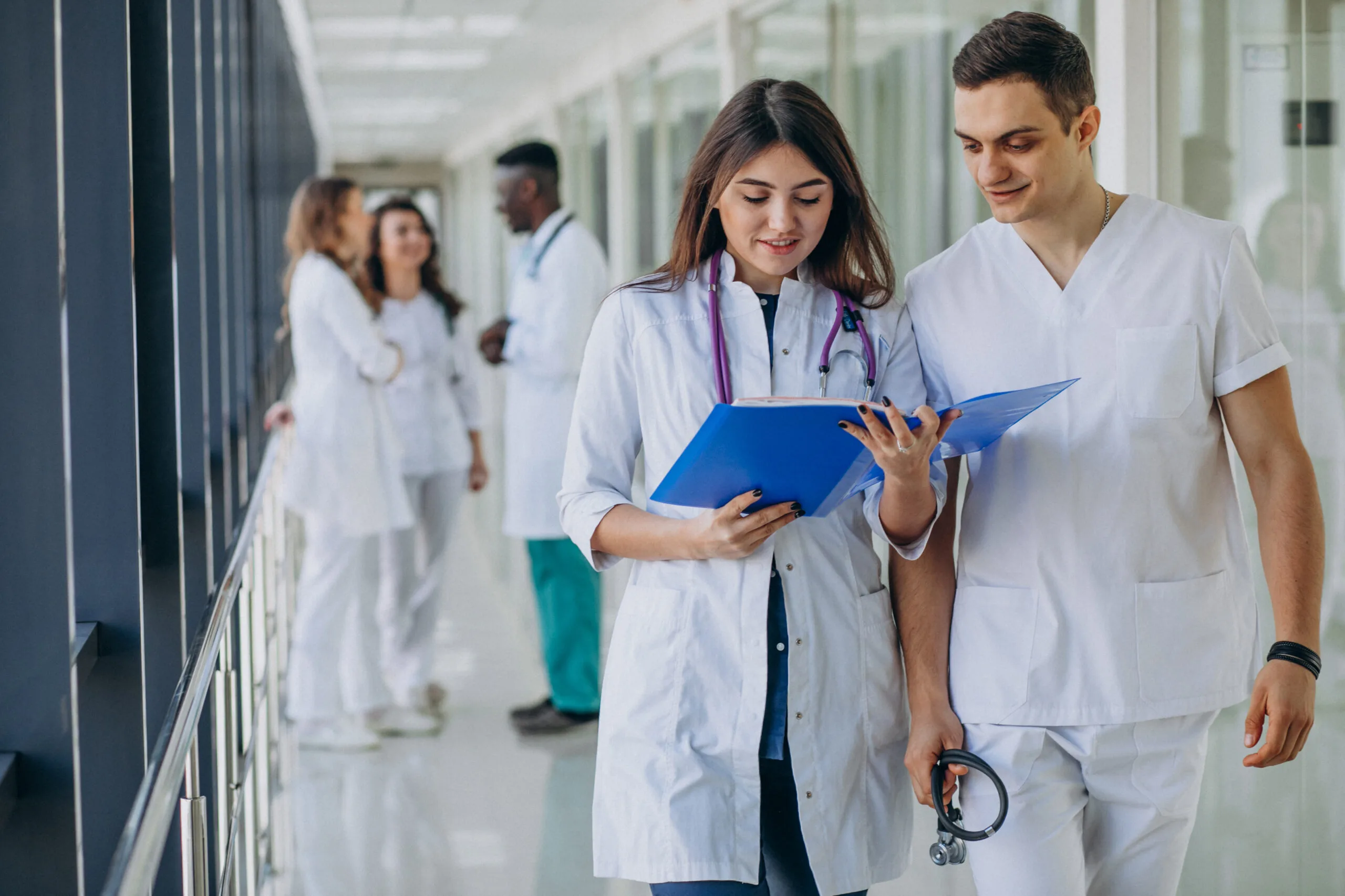 MBBS Abroad 2026 - team of young specialist doctors in a hospital corridor